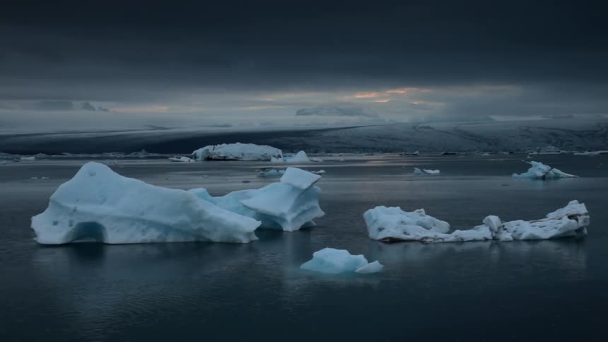 Large icebergs are floating in the water
