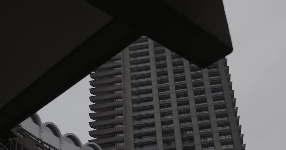 A city skyscraper towers overhead