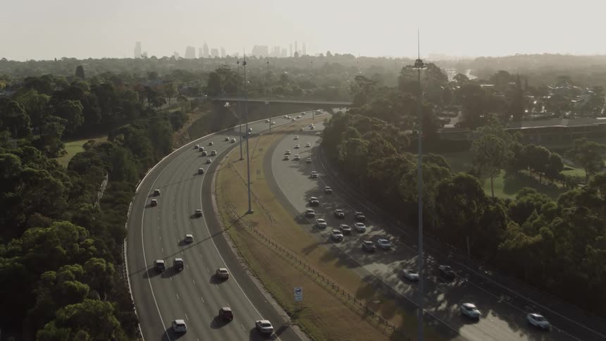 Traffic is moving in both directions on a divided highway