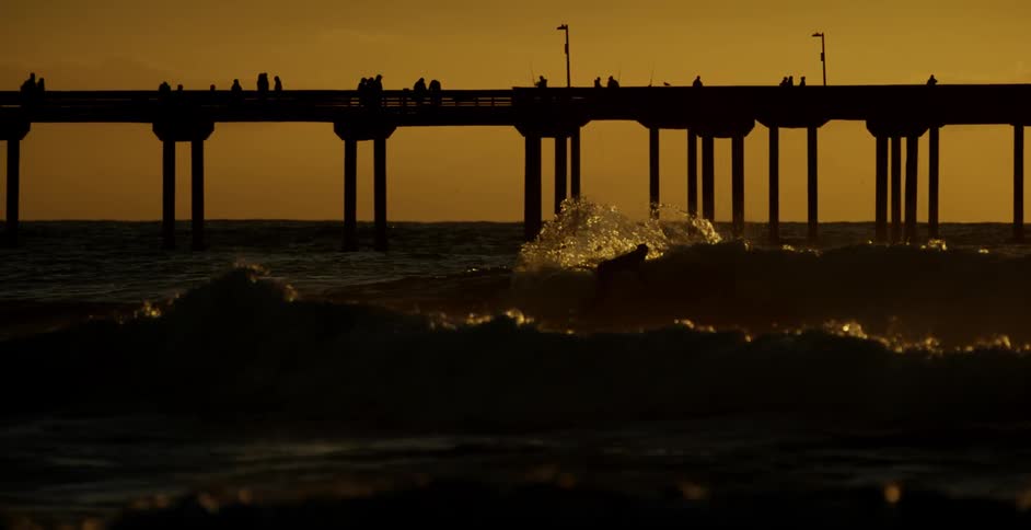 A view of a large bridge over rough waters