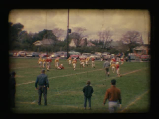 A group of children playing football