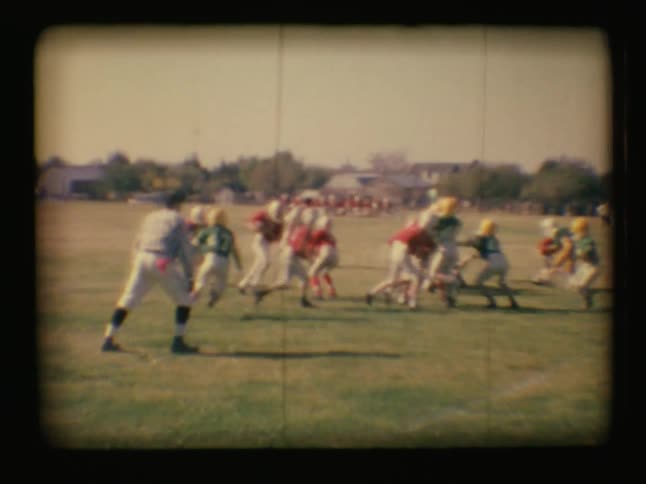 Boys plays on opposing football teams