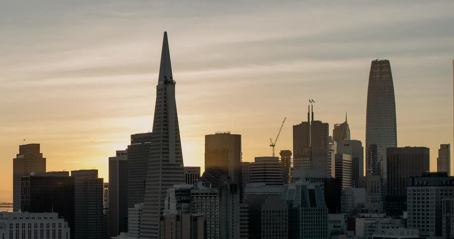 The city is brightly lit at dawn