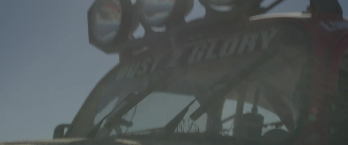 Windshield wipers move back and forth on a racing off-road vehicle