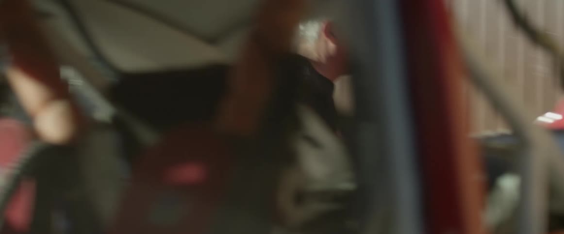 A man walks past the car go to inside