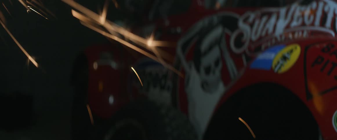Sparks flying as a man works with tools