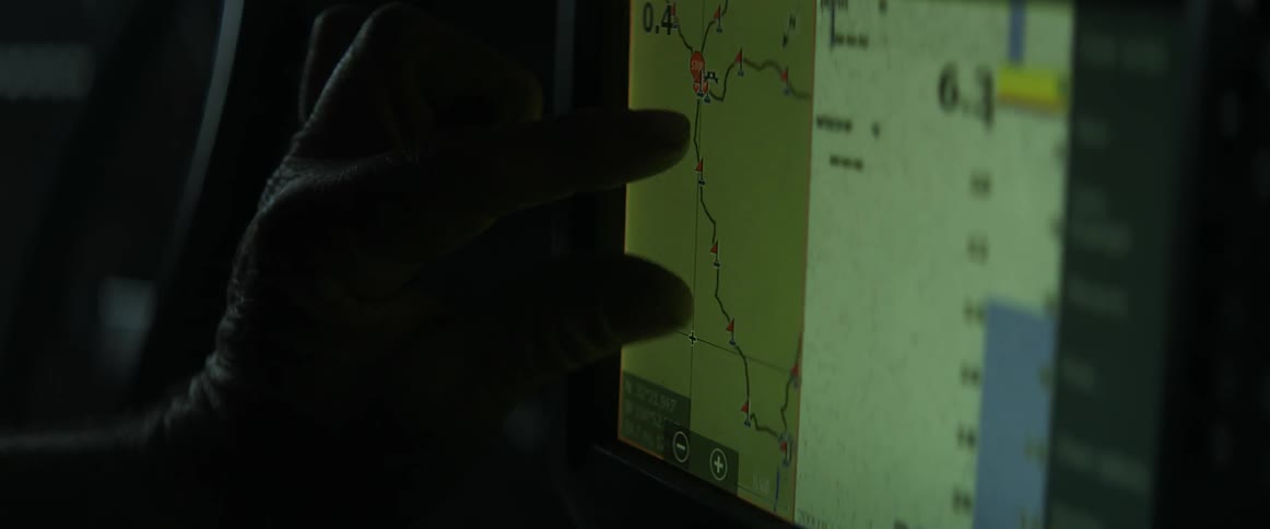 Person tapping a computer screen map