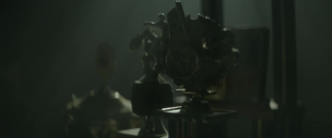 Dust scatters in a room with trophies