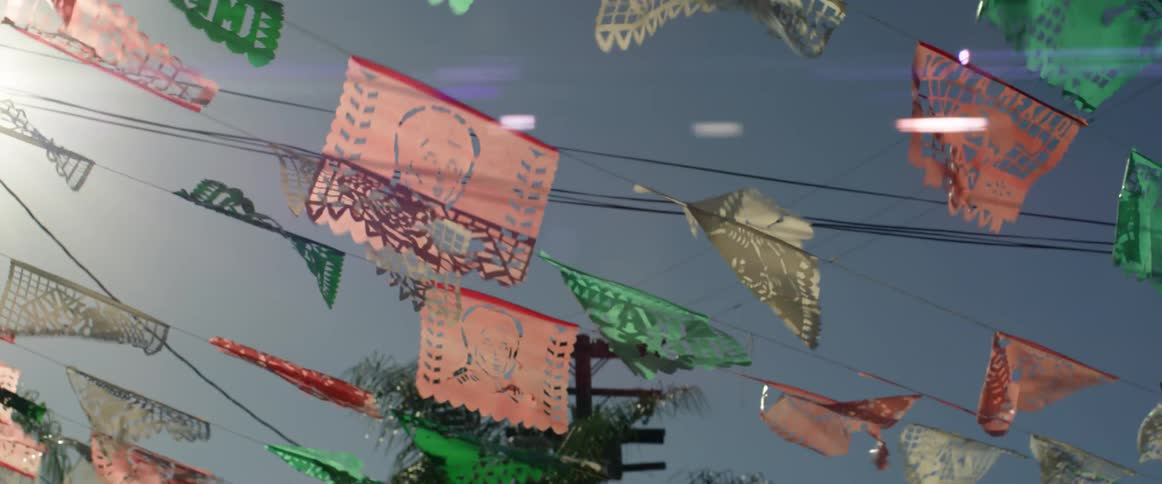 Wind blows through rows of celebratory flags