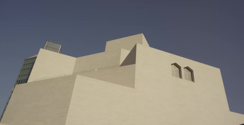 Cubic building against a clear blue sky