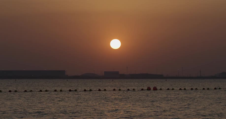 Sun sets over the ocean