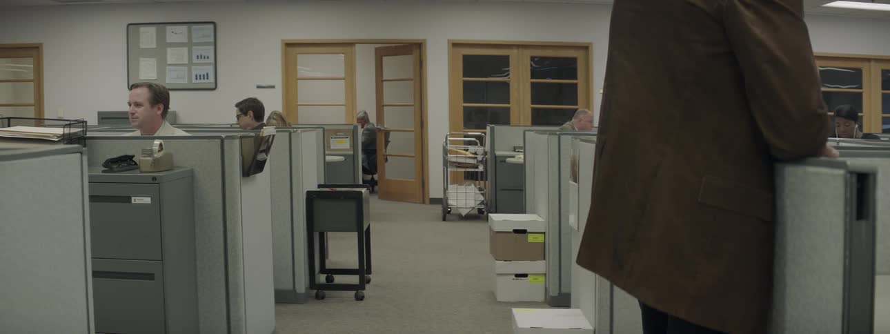 People work in an office environment