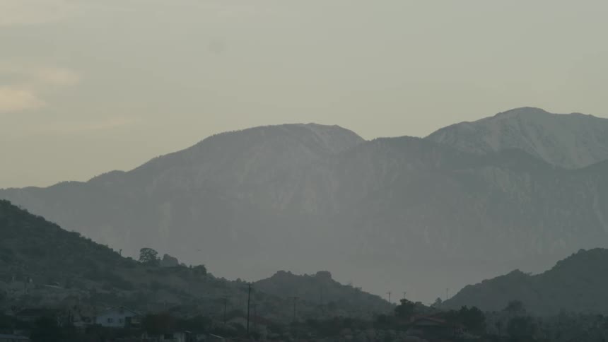 Mountains and hills on a hazy horizon