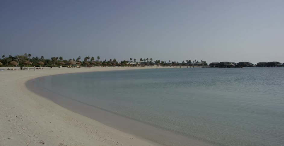 Water ripples and flows on a sandy beach