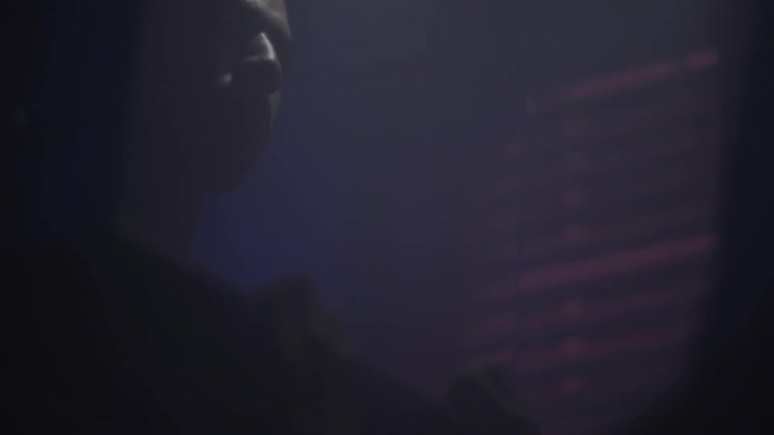 Silhouette of a statue at night