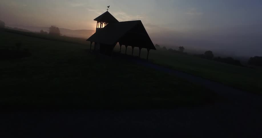 Structure in the dark as the sun rises behind