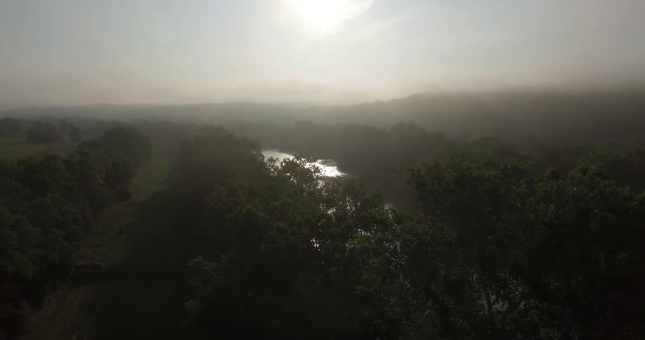 A river running through a forested region