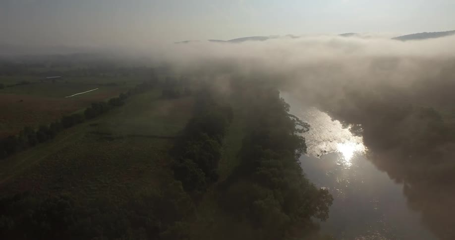 Aerial of a misty river