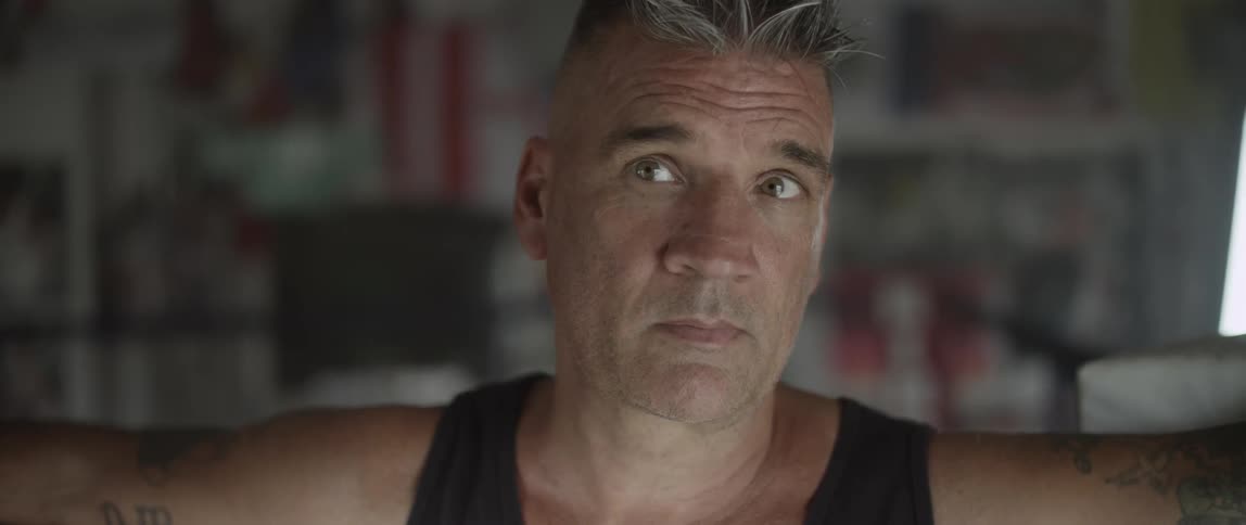 Man looking intently across a room