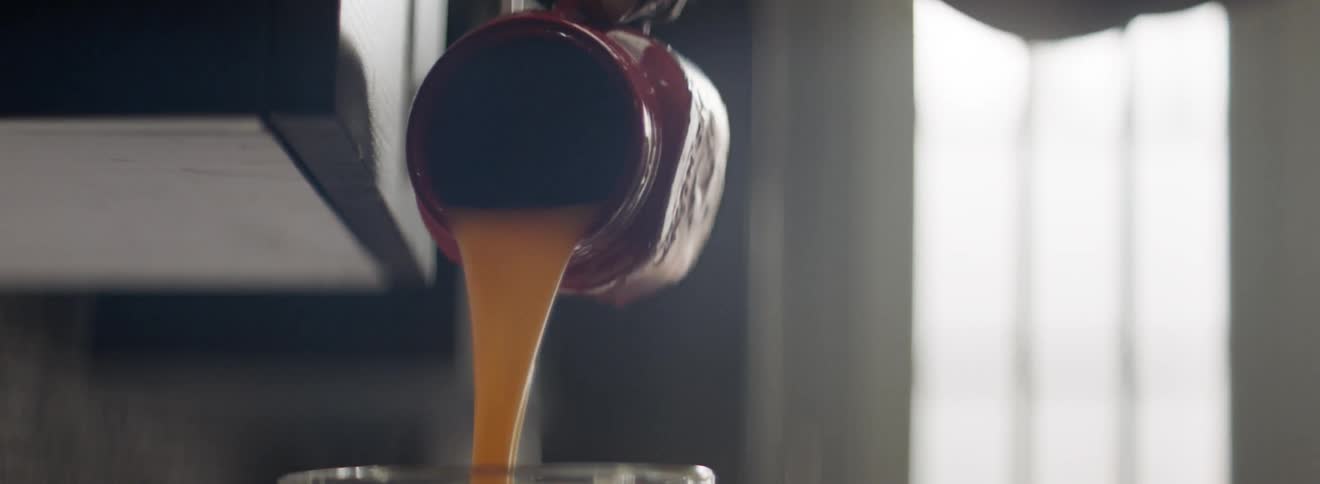 Juice is poured into a blender