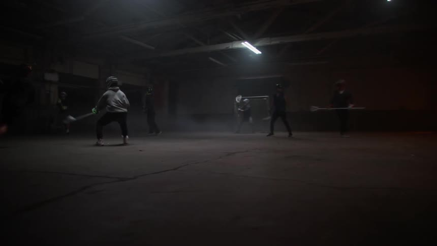 Players run the ball down the gym floor