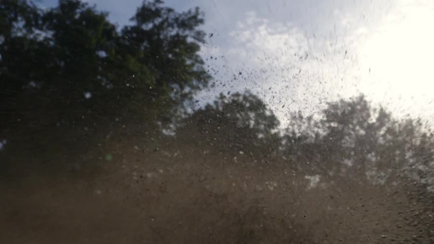 Dirt bikes race through the mud