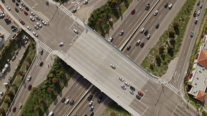 Cars drive on a city highway