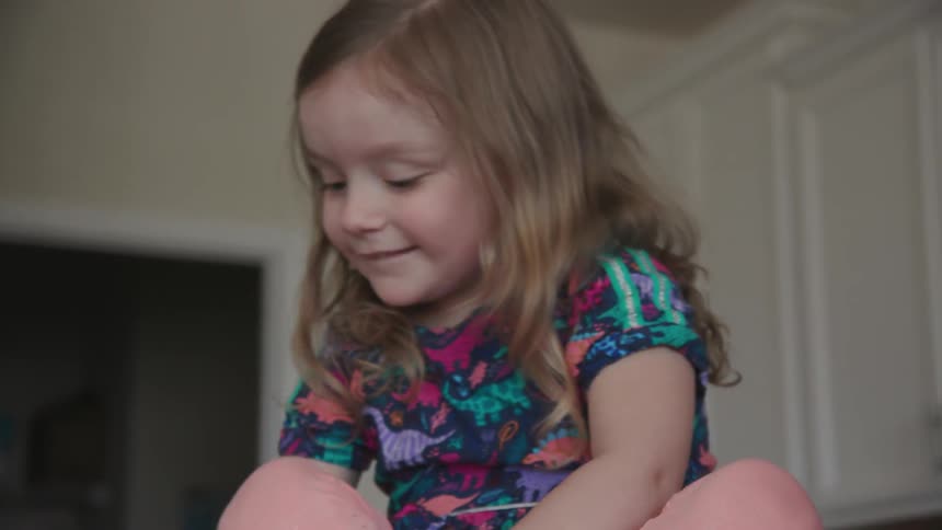 A mom and daughter dye easter eggs