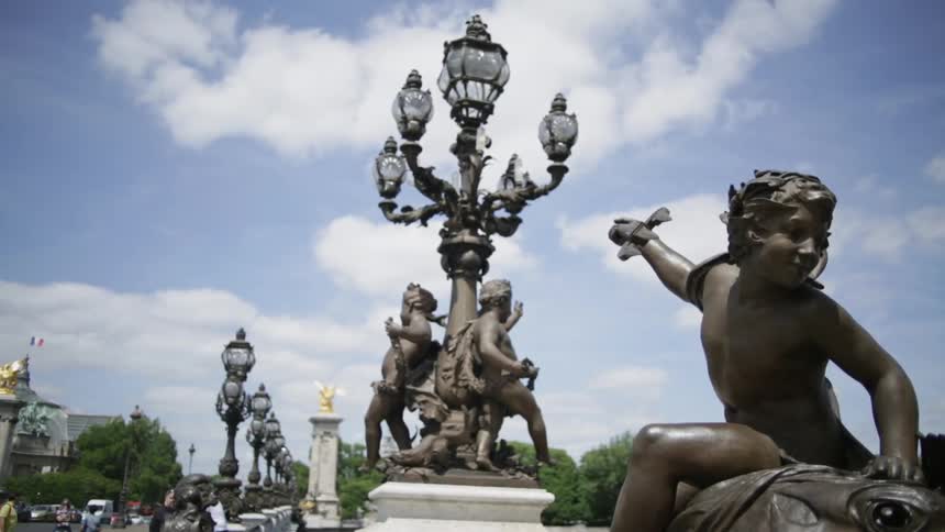 Ornate lamp posts line a walkway