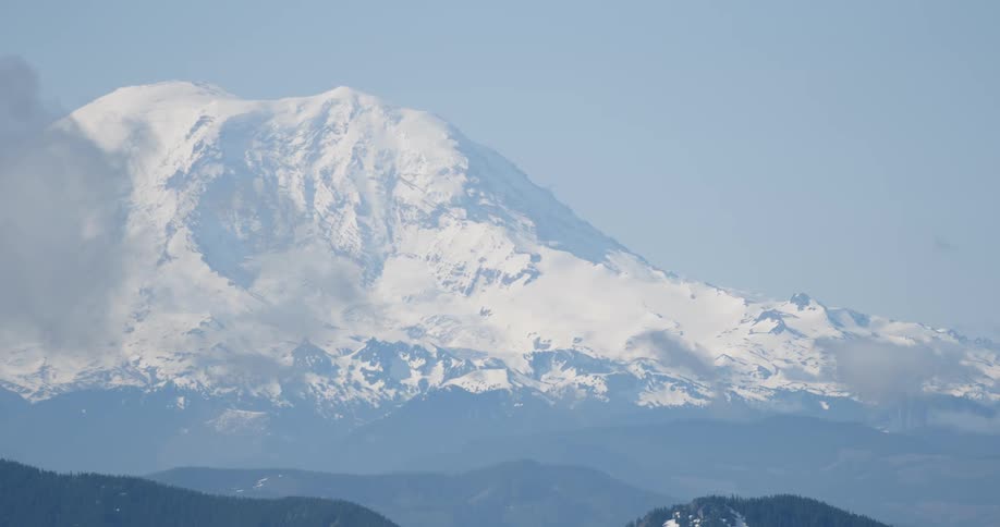 Snow and ice cover a mountain