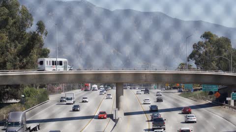 Cars travel on the highway under the overpass