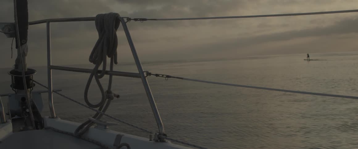 A boat floats on the ocean