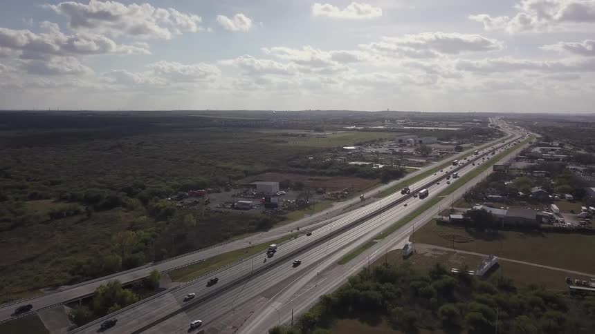 A busy highway through a small town