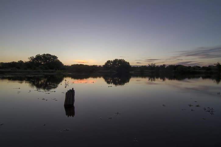 Day turns to night in a wetlands landscape