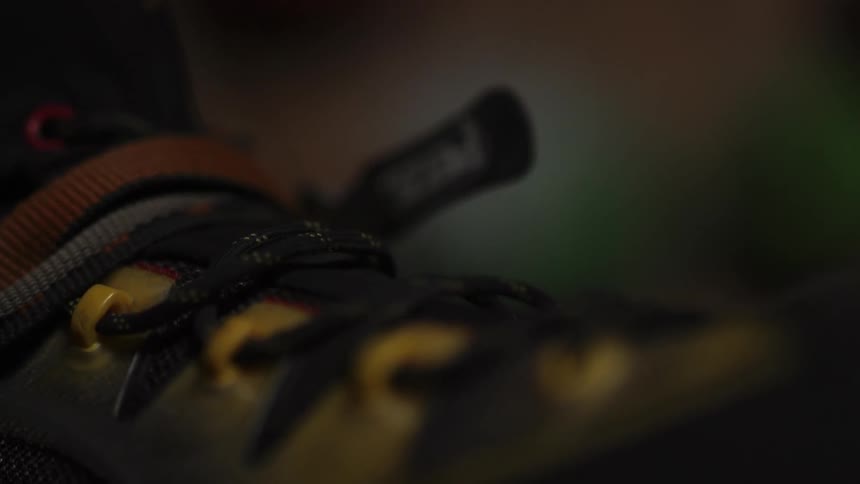The shoe has laces that are done