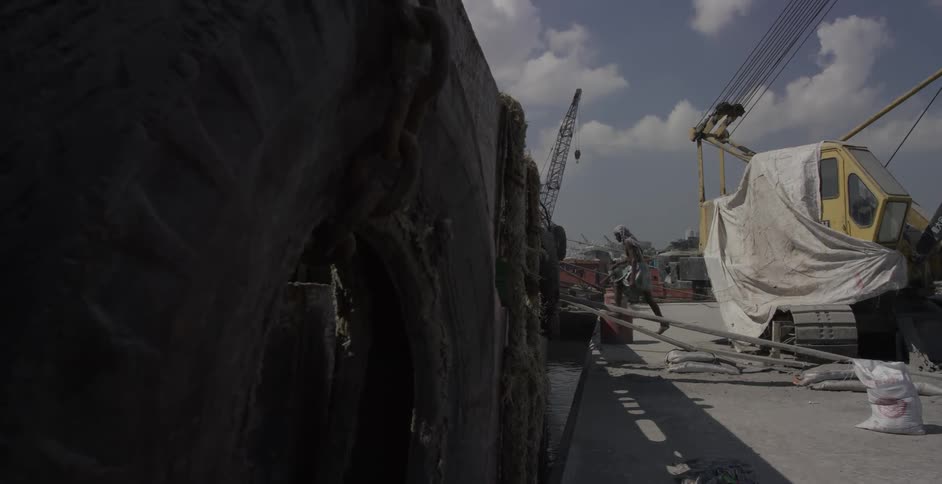 A person walks up on a large ship