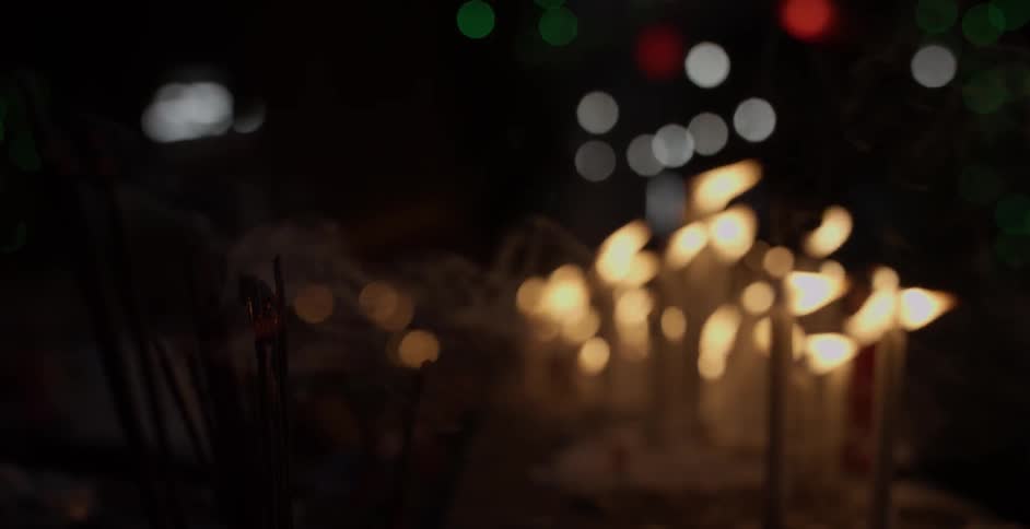 The candles are grouped together and lit at night