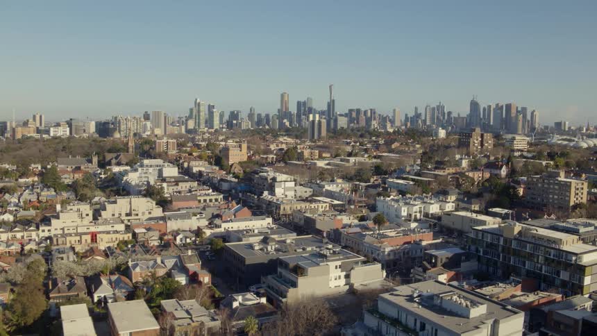 City buildings are shown on a clear day