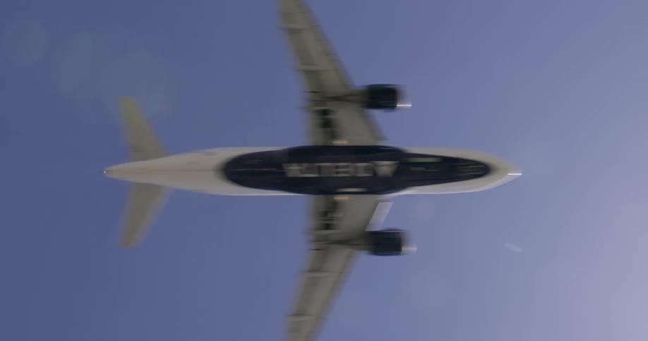 A plane flies in the sky overhead