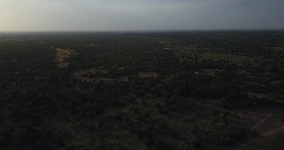Heavy clouds are above the wilderness below