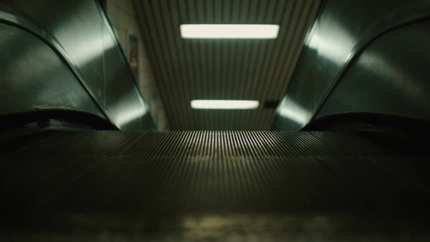 An escalator moves with no passengers