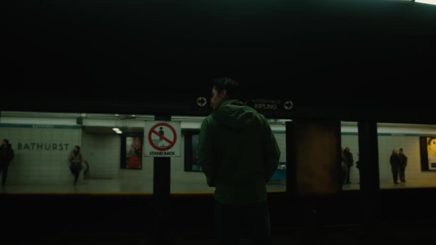People are waiting all over the subway for their train