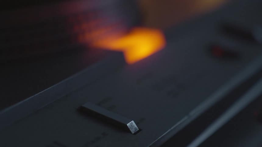 A person presses the button on the machine