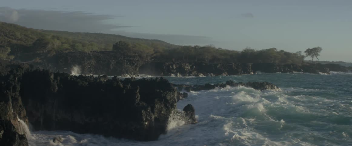 Waving are crashing along a shore
