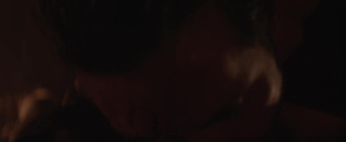 A man is being attacked as he lays on the ground
