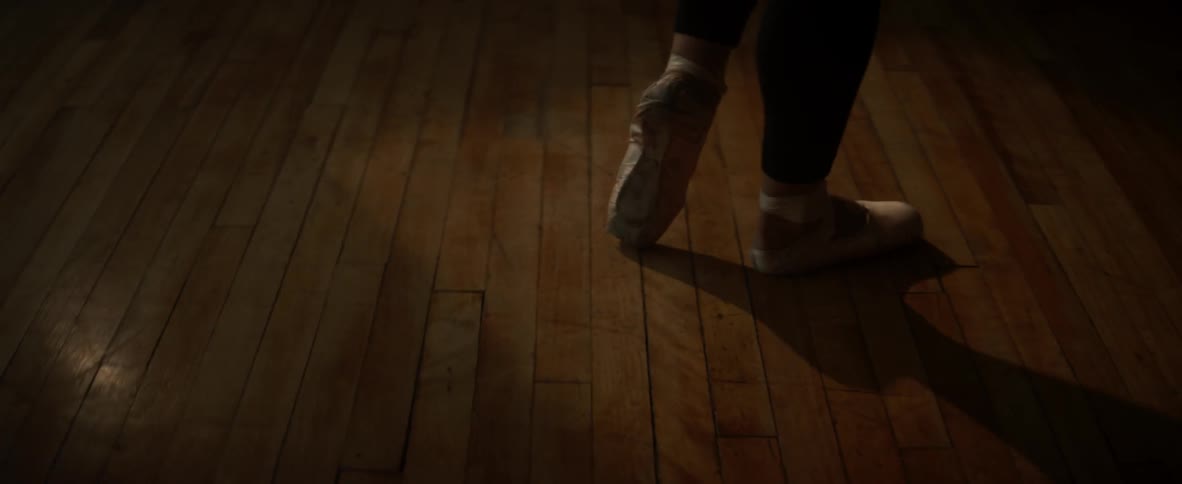 Ballerina spins around in ballerina shoes