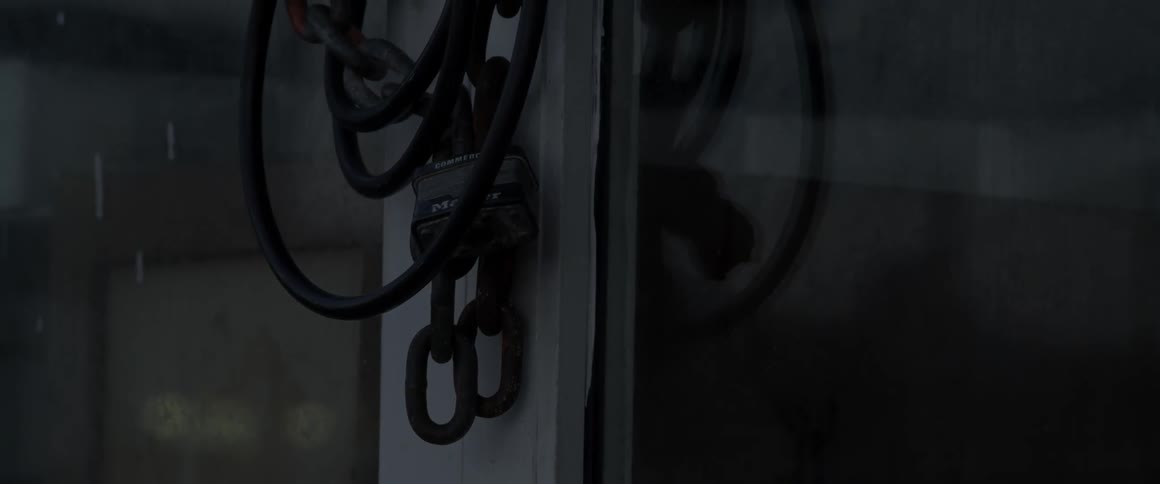 A door is chained and locked