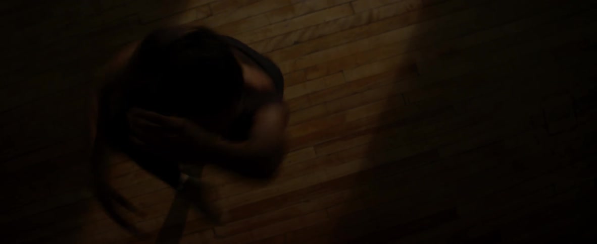 A ballerina spins in a dance studio