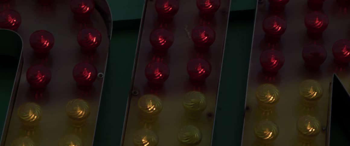 The lights on this sign slowly turn on