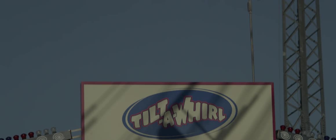 A large sign is blue, white, and red in color